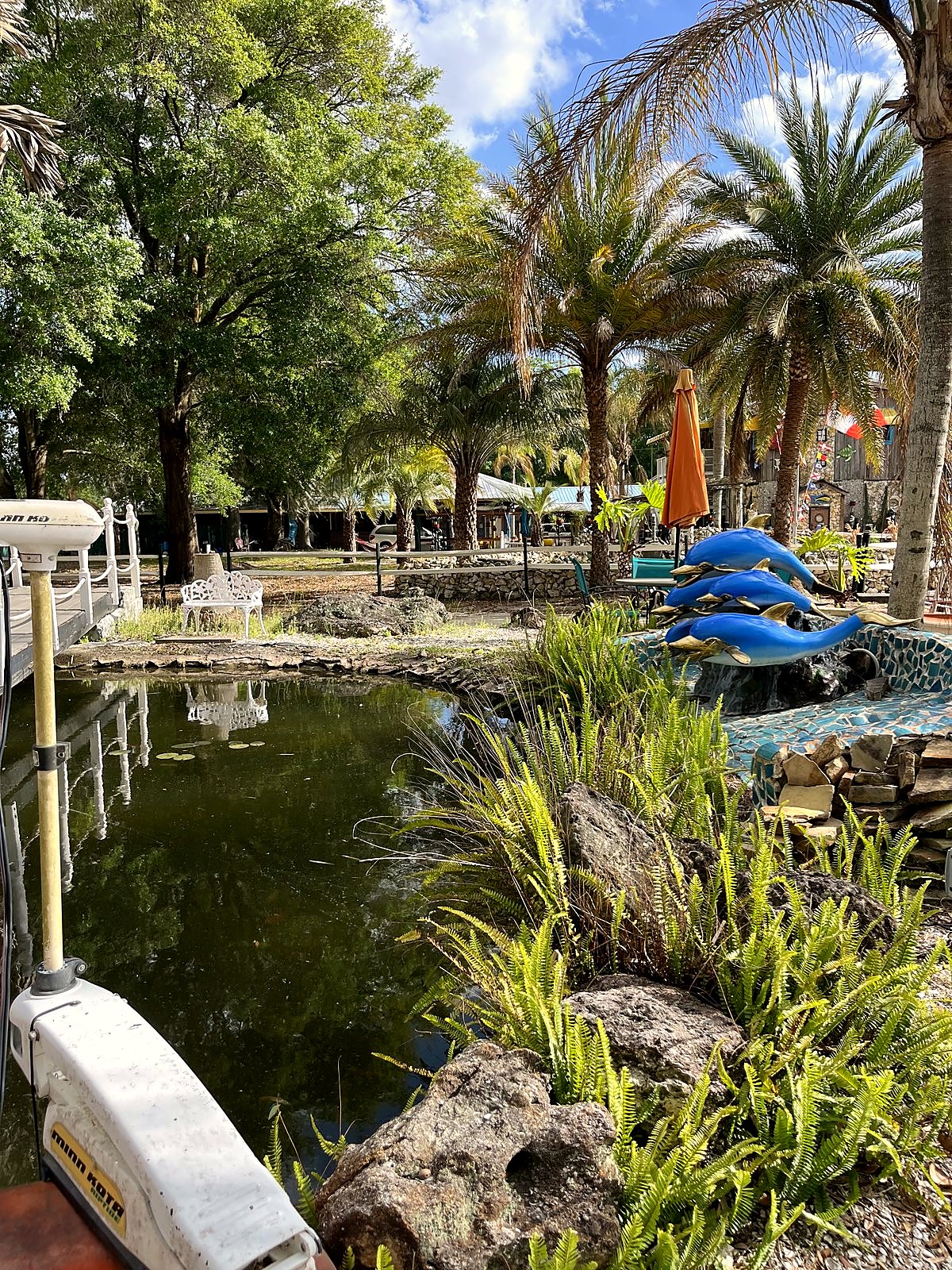 Twin ponds with fountains and lily pads